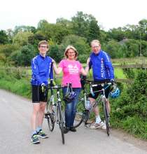 Ness Hawkings with her husband, Hugo, and son Inigo (16) before they start their cycle challenge in aid of the new Breast Cancer Unit at Salisbury Dis